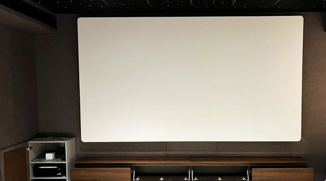 Completed project by Lumina Screens showcasing a high-performance AV screen installed in a modern home theater setup